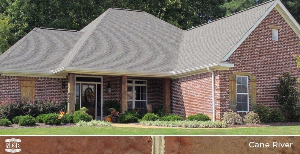 Stunning red brick home with craftsman details with North Georgia Brick in color Cane River