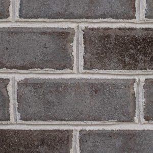A picture containing building, brick, stone, ledge

Description automatically generated
