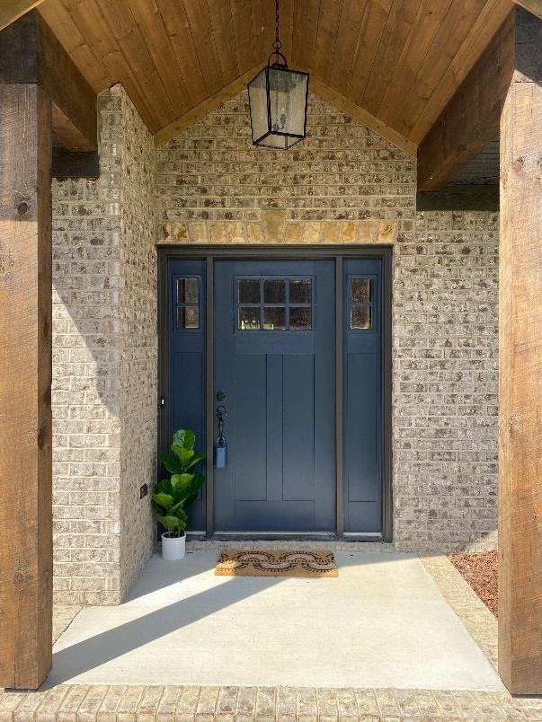 A blue door in a stone building

Description automatically generated with medium confidence