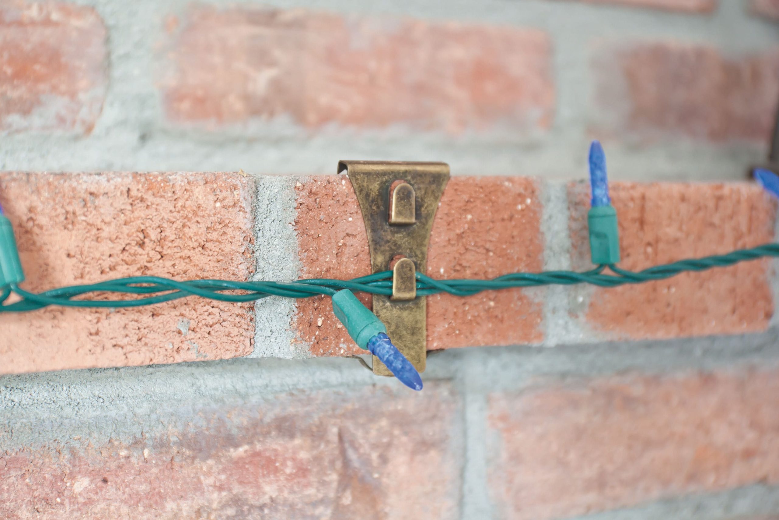 Brick Clip installed on brick to hang holiday lights
